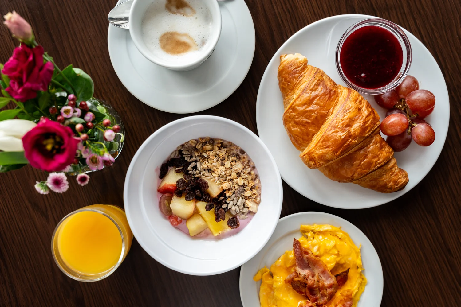 Light-filled breakfast room photographed to show space and atmosphere Modern hotel breakfast room with large windows and daylight